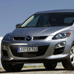 Бампер передний в цвет кузова Mazda CX7 (2010-) рестайлинг